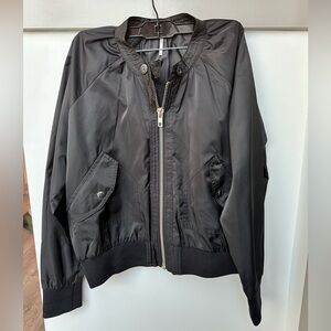 Free people black bomber jacket with silver zip detail. Size S.